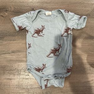 KATE QUINN Kangaroo Bodysuit